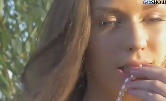 Happy Brunette Teases Outdoor Passion